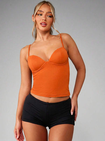 Women’s plain backless cami top with spaghetti straps and a slim fit, designed in high-stretch knitted fabric for casual beach and vacation wear.