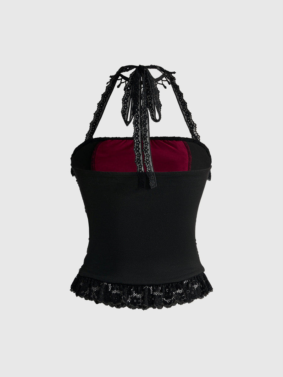 A women's gothic halter cami crop top featuring contrast lace patchwork, velvet fabric, backless knot detail, and slim fit.