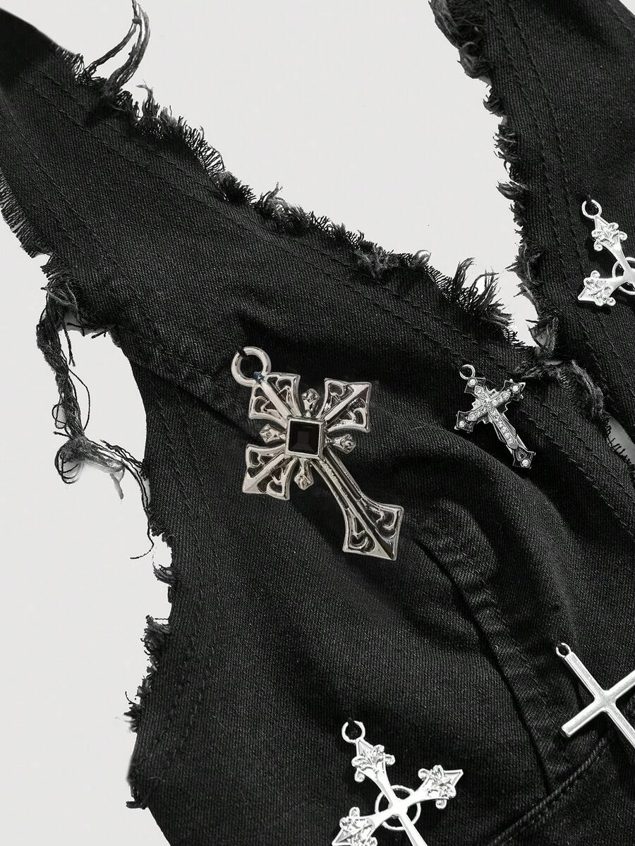Black goth halter denim crop top featuring a backless cross lace-up design and asymmetrical hem on a model.