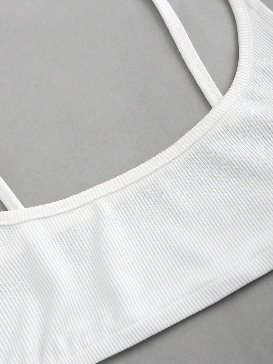 Women's black cropped camisole top with faux crocodile texture, backless spaghetti straps, and matching arm sleeves.
