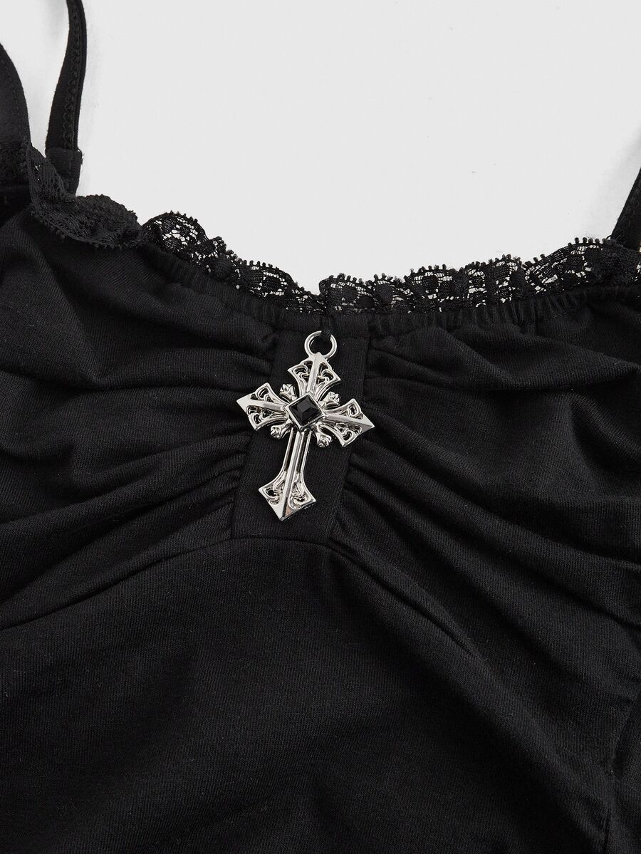 A black gothic slim-fit tank top featuring contrast lace patchwork detailing, ruched frill trim, and thin spaghetti straps made from soft knitted stretch fabric.
