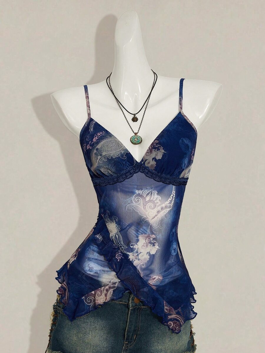 Women's burgundy floral graphic print mesh camisole top featuring an asymmetrical hem, backless cut, and spaghetti straps.