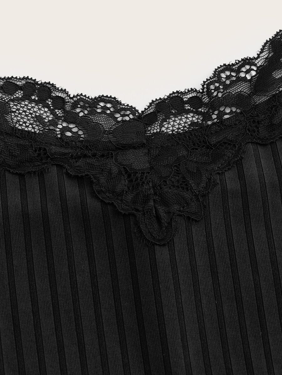 Women's black rib-knit cami top featuring delicate contrast lace trim and thin spaghetti straps.