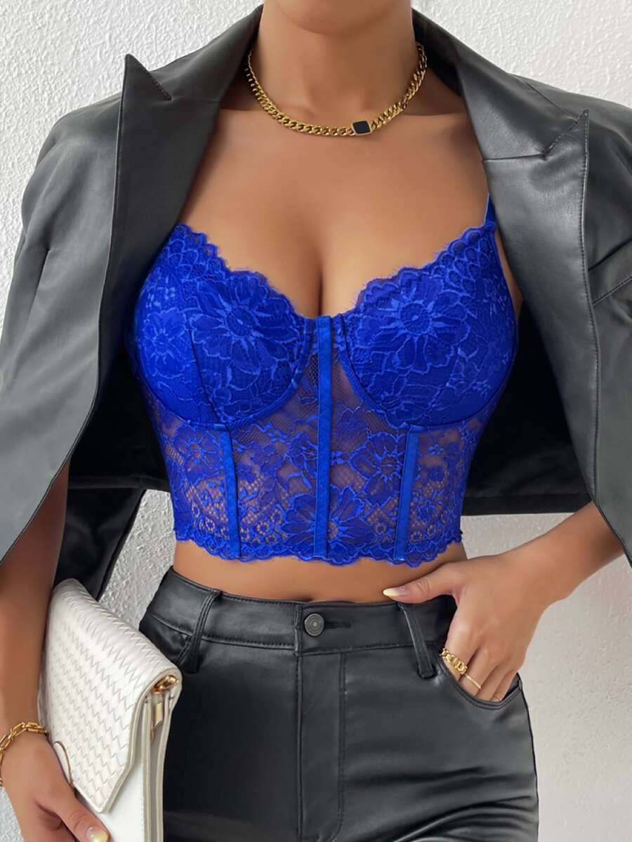 Women wearing a black lace bustier crop cami top with spaghetti straps and slim fit corset detailing.