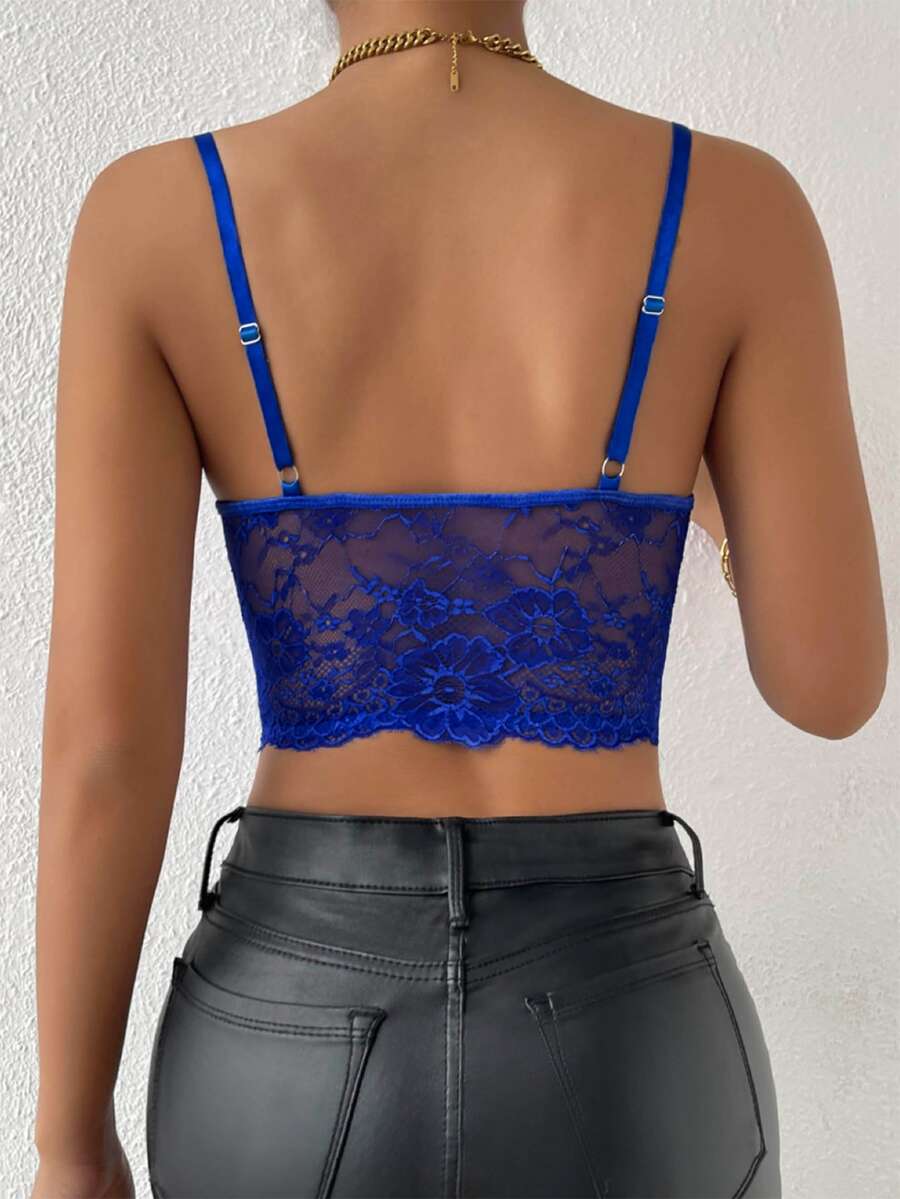 Women wearing a black lace bustier crop cami top with spaghetti straps and slim fit corset detailing.