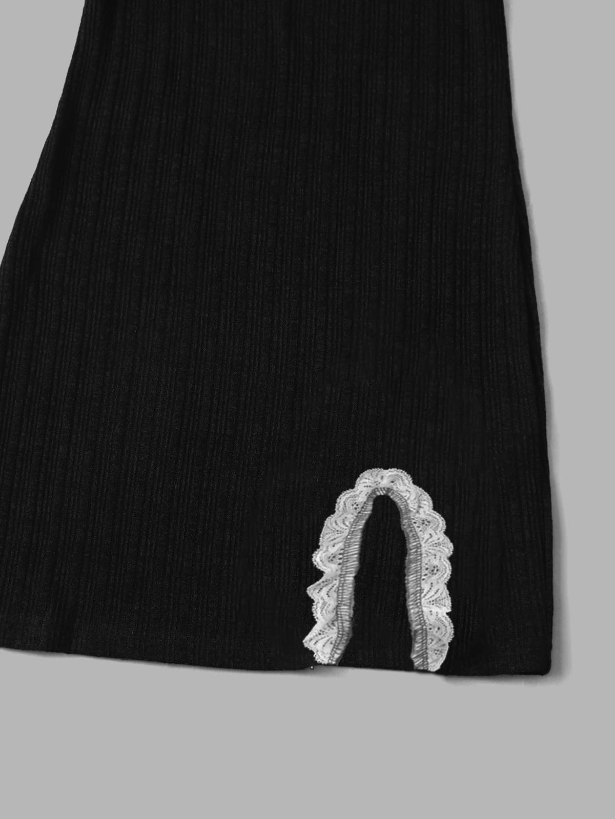 Women's black ribbed bodycon mini dress with scoop neck, short sleeves, contrast lace trim, and side split hem.