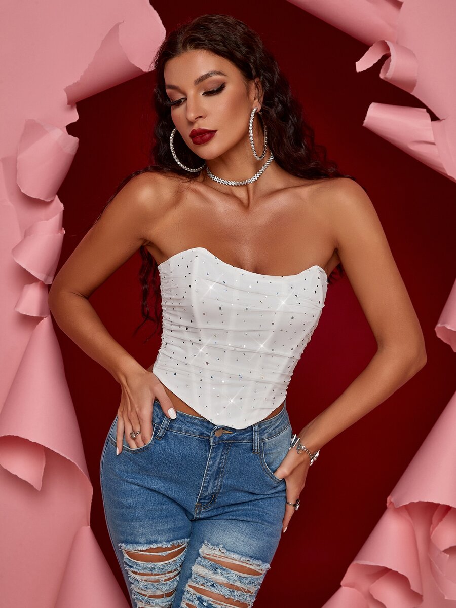White strapless asymmetrical ruched crop top for women with lace-up side details.
