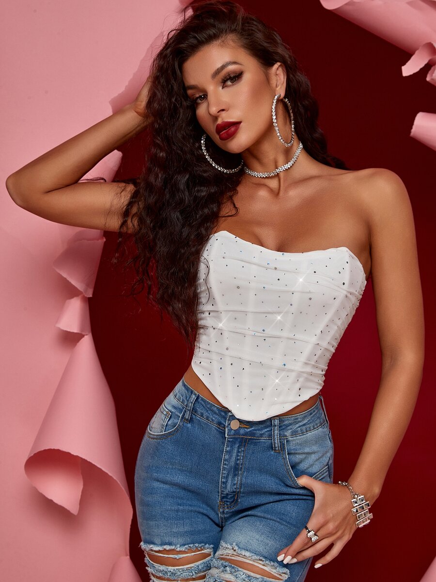 White strapless asymmetrical ruched crop top for women with lace-up side details.
