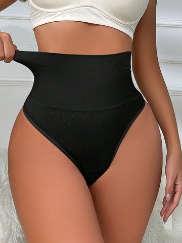 Black high waisted seamless shapewear thong for women featuring super high waist design and stretchy breathable fabric.
