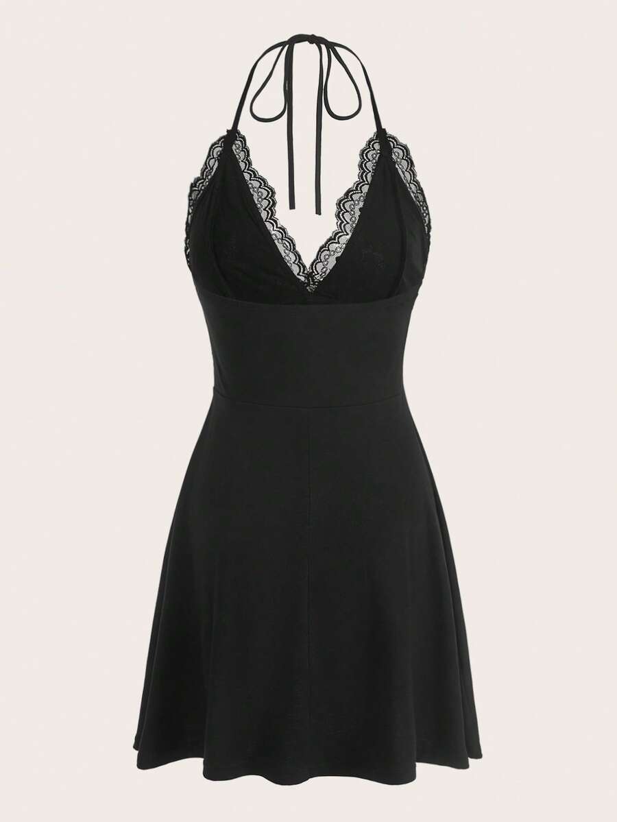 Front and back view of a black backless halter neck mini dress featuring a high waist and flared hem.