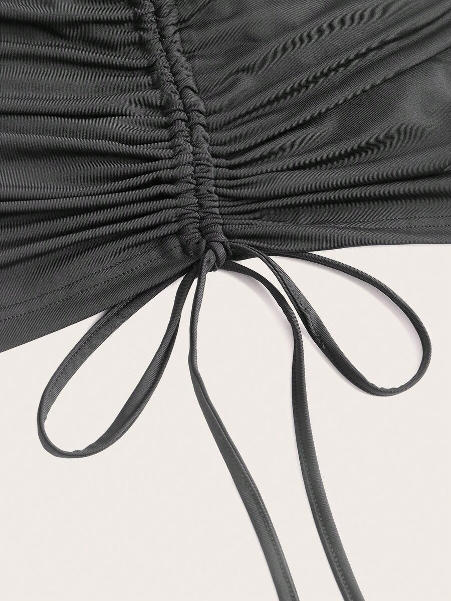 Black drawstring side ruched bodycon mini skirt for women with natural mid waist.