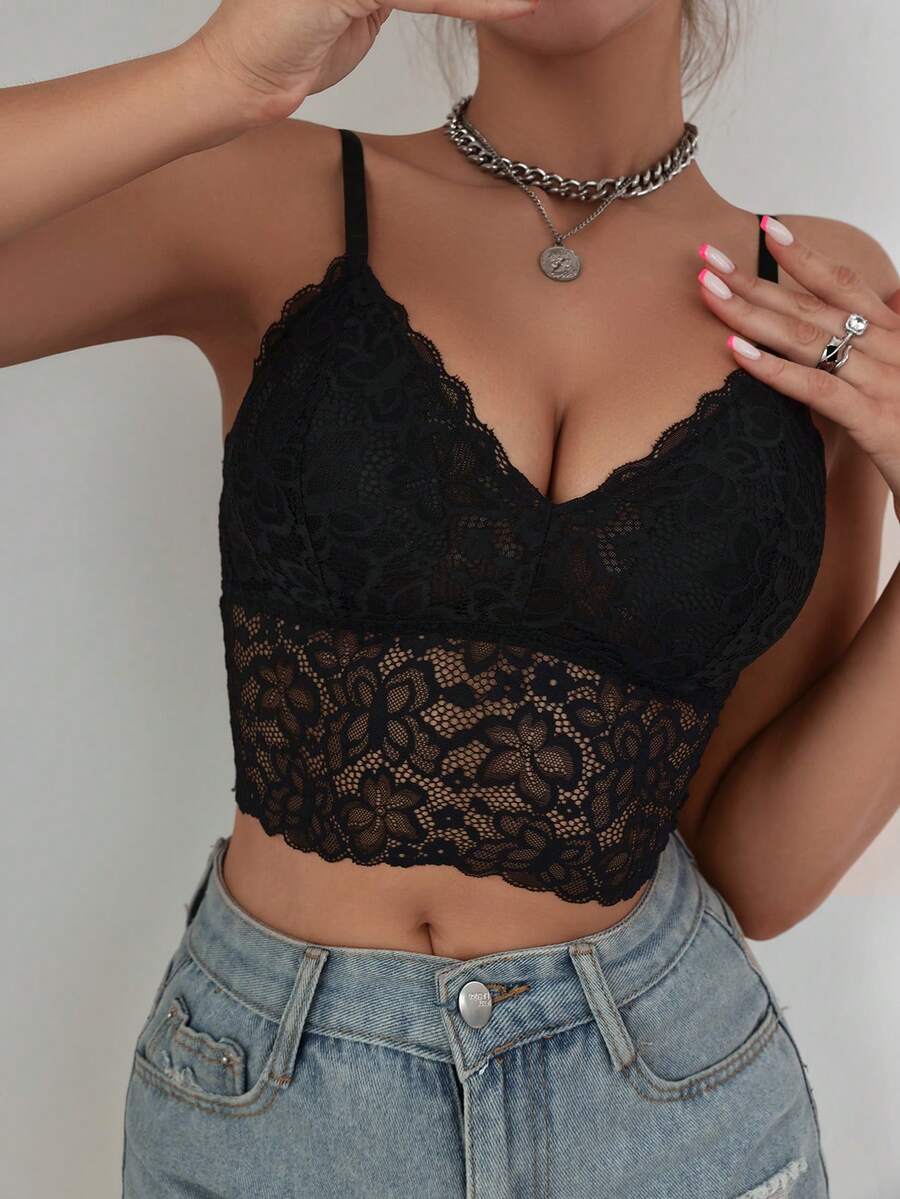 Women's black lace crop cami top featuring romantic French scallop trim, criss-cross spaghetti straps, and removable padded cups.