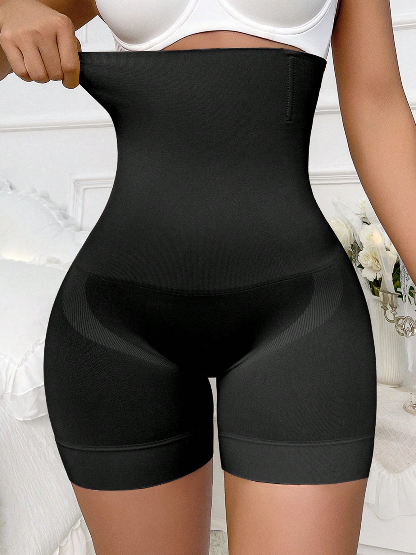 Apricot high stretch super high waist long shapewear shorts with textured pattern and semi-sheer fabric for women.
