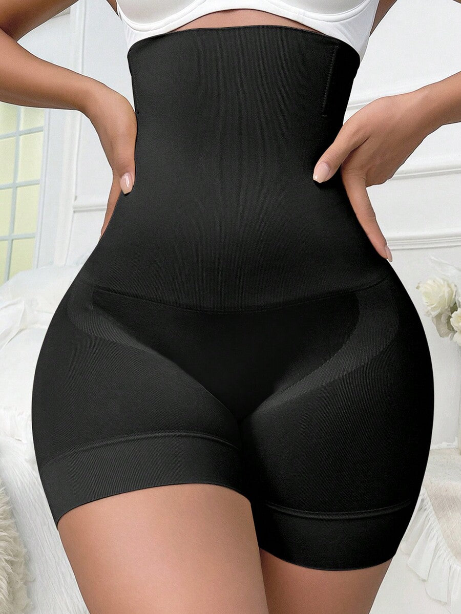 Apricot high stretch super high waist long shapewear shorts with textured pattern and semi-sheer fabric for women.