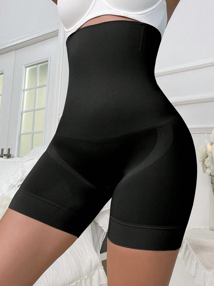 Apricot high stretch super high waist long shapewear shorts with textured pattern and semi-sheer fabric for women.