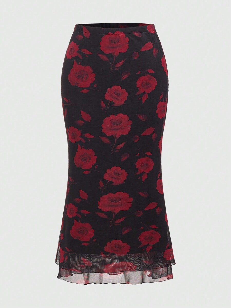 Women's Floral Pattern Mesh Skirt in black featuring a high waist, long mermaid cut, side split, and ruffle lettuce trim.