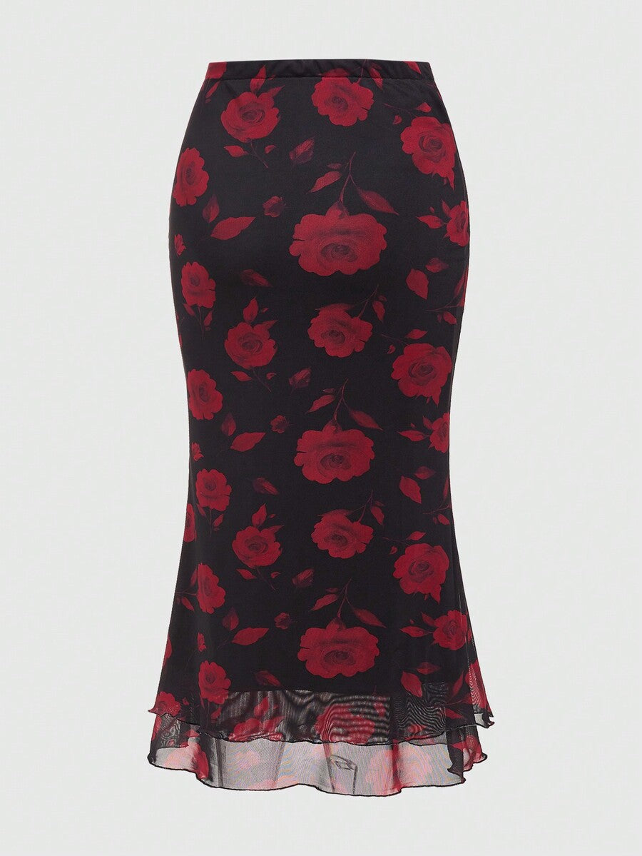 Women's Floral Pattern Mesh Skirt in black featuring a high waist, long mermaid cut, side split, and ruffle lettuce trim.