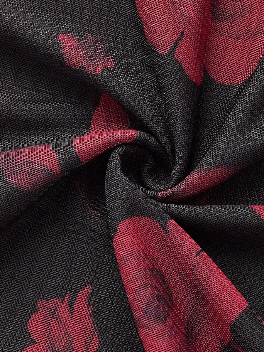Women's Floral Pattern Mesh Skirt in black featuring a high waist, long mermaid cut, side split, and ruffle lettuce trim.