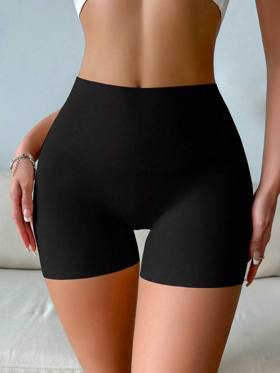Women wearing apricot super high waist shapewear shorts designed for ultra-light thigh smoothing