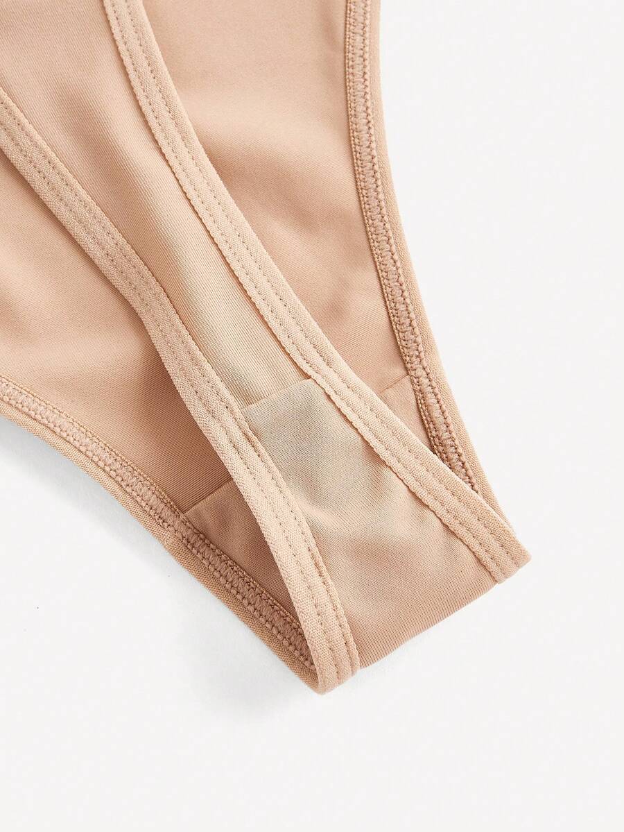 Apricot backless shapewear bodysuit with thong cut, cup details, and high-stretch fabric for light tummy support.