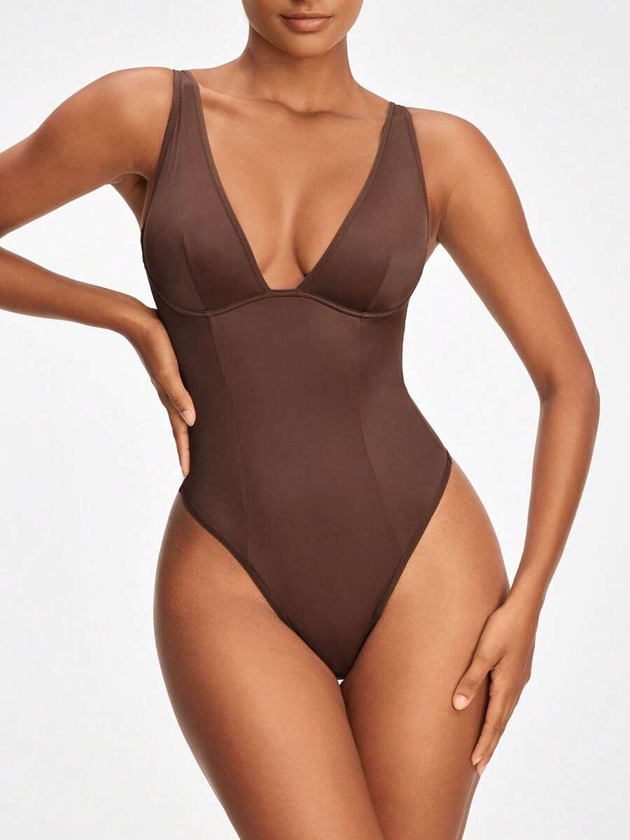 Apricot backless shapewear bodysuit with thong cut, cup details, and high-stretch fabric for light tummy support.