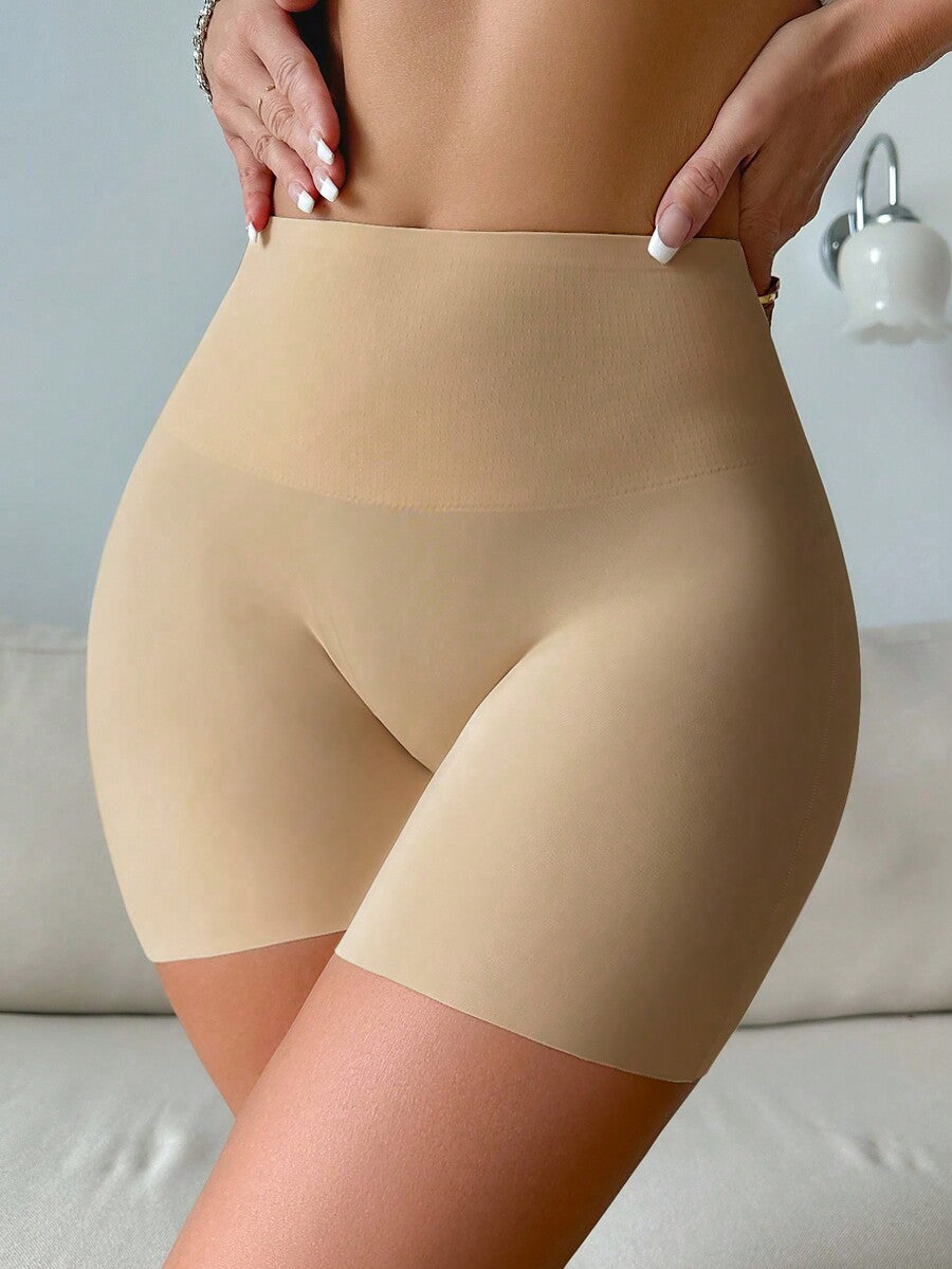 Women wearing apricot super high waist shapewear shorts designed for ultra-light thigh smoothing