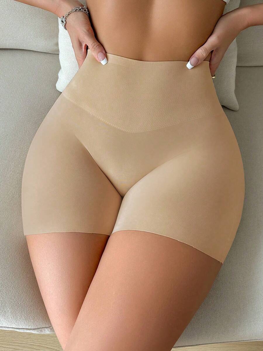Women wearing apricot super high waist shapewear shorts designed for ultra-light thigh smoothing