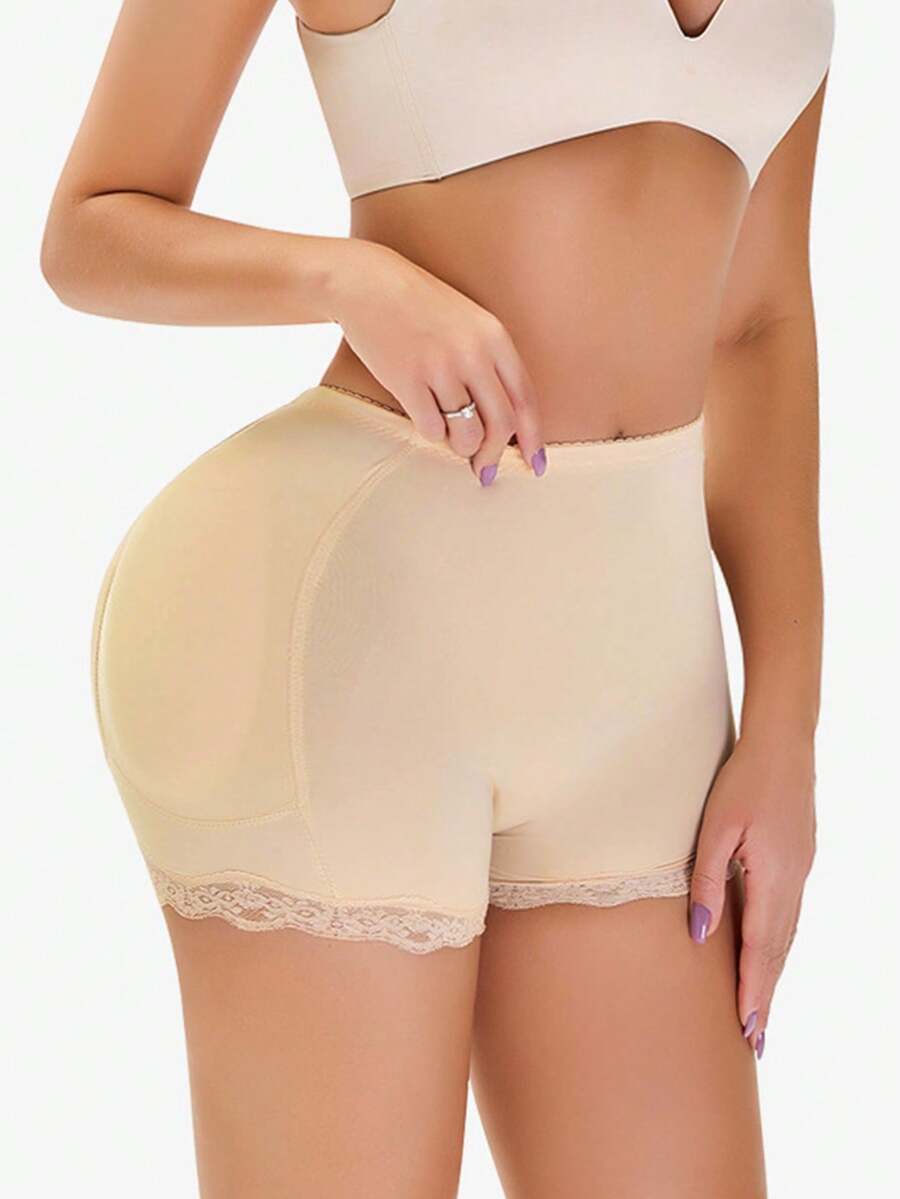 Women's tummy control shapewear shorts featuring detachable sponge padding, contrast lace trim, and medium stretch knitted fabric.