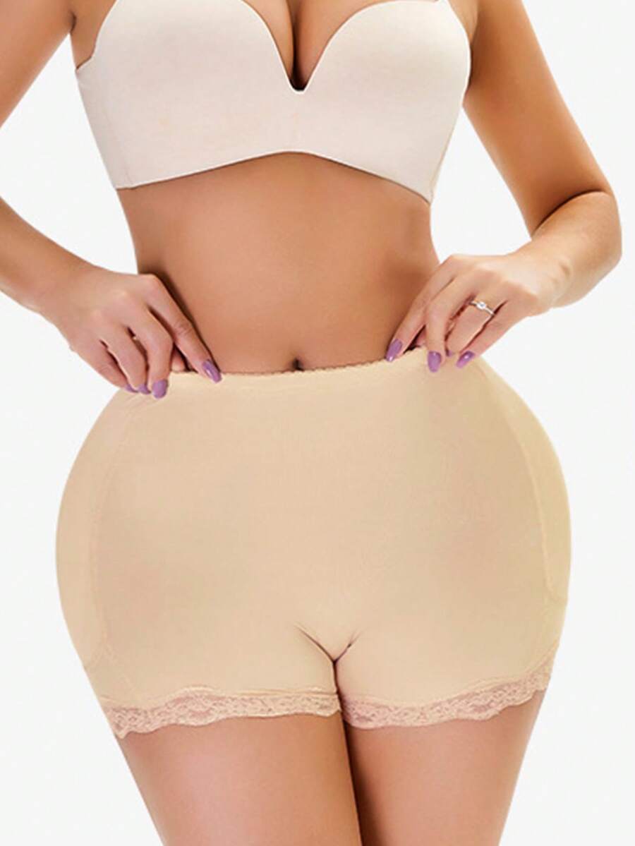 Women's tummy control shapewear shorts featuring detachable sponge padding, contrast lace trim, and medium stretch knitted fabric.