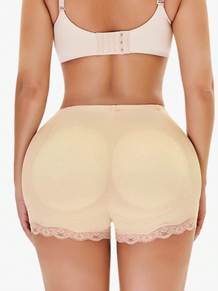 Women's tummy control shapewear shorts featuring detachable sponge padding, contrast lace trim, and medium stretch knitted fabric.