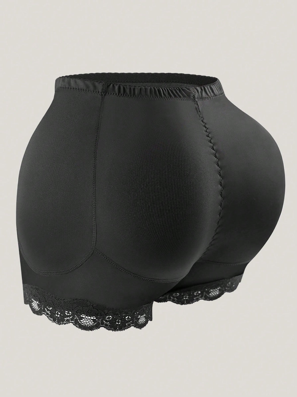 Women's tummy control shapewear shorts featuring detachable sponge padding, contrast lace trim, and medium stretch knitted fabric.