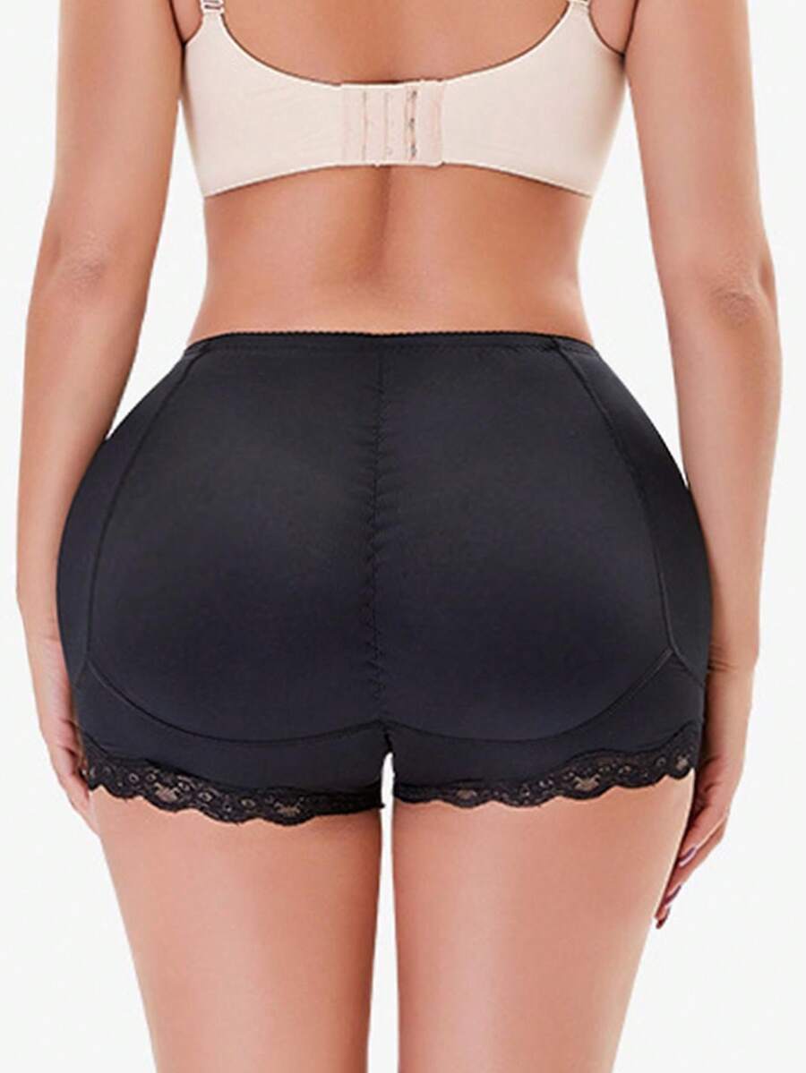 Women's tummy control shapewear shorts featuring detachable sponge padding, contrast lace trim, and medium stretch knitted fabric.
