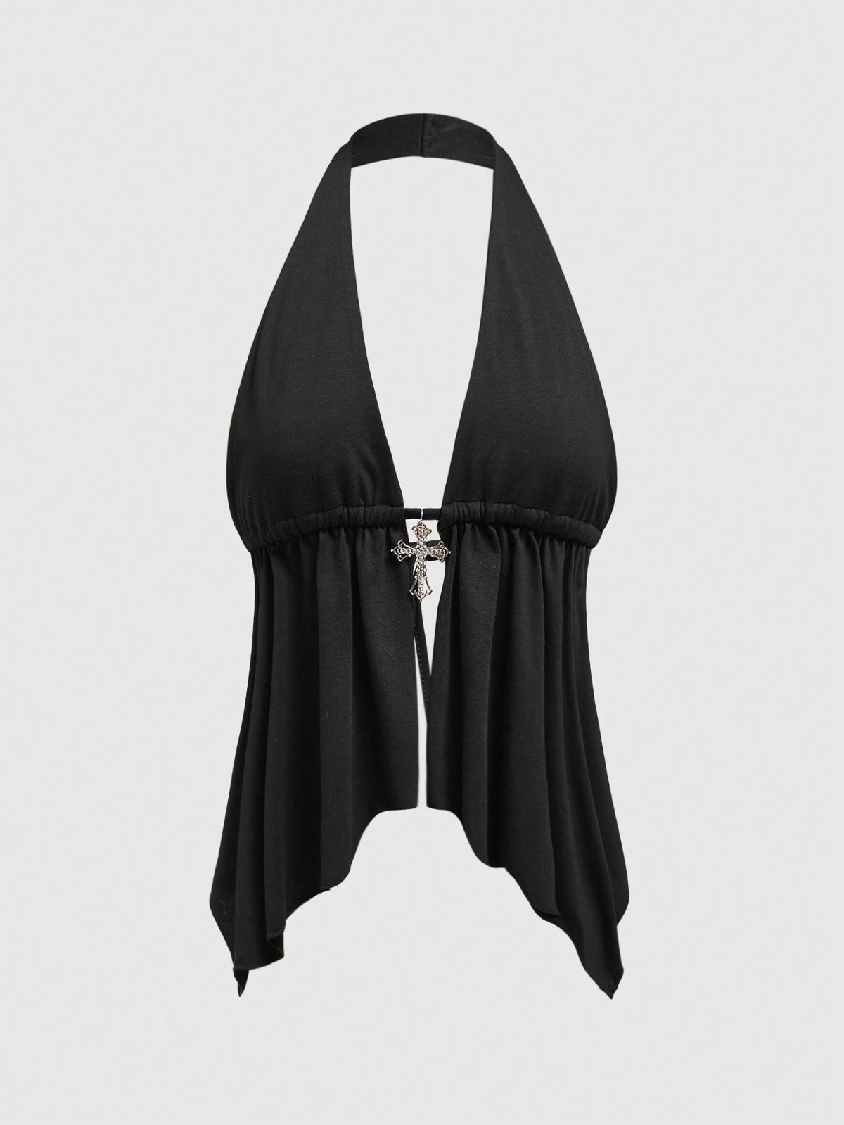 A women wearing a black halter crop top with a shiny rhinestone cross pendant, neck strap, backless cut, and asymmetrical ring detail.