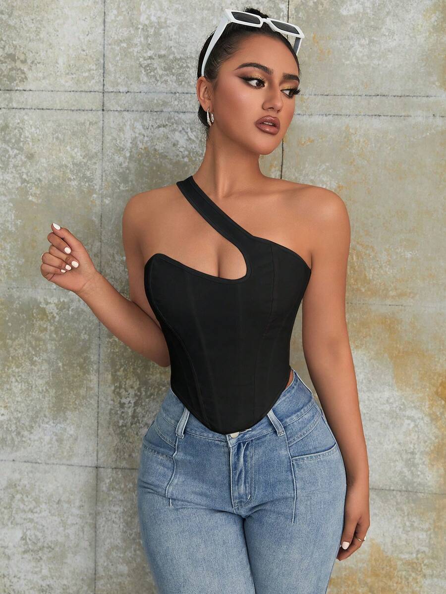 Women's black Y2K one-shoulder sleeveless backless crop top featuring an asymmetrical neckline and lace-up cutout design.