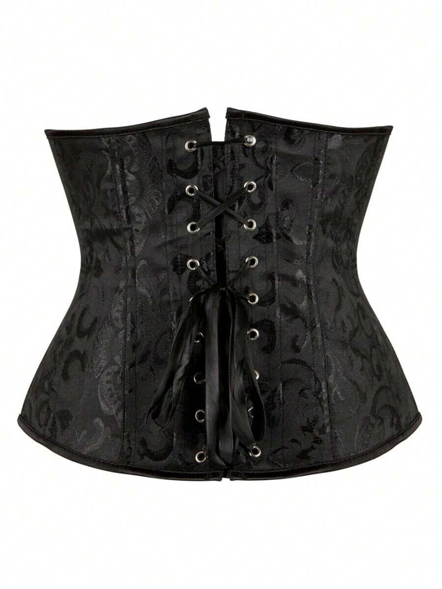 Vintage lace-up waist trainer corset with grommet eyelet details and plant pattern, designed for Halloween styling.