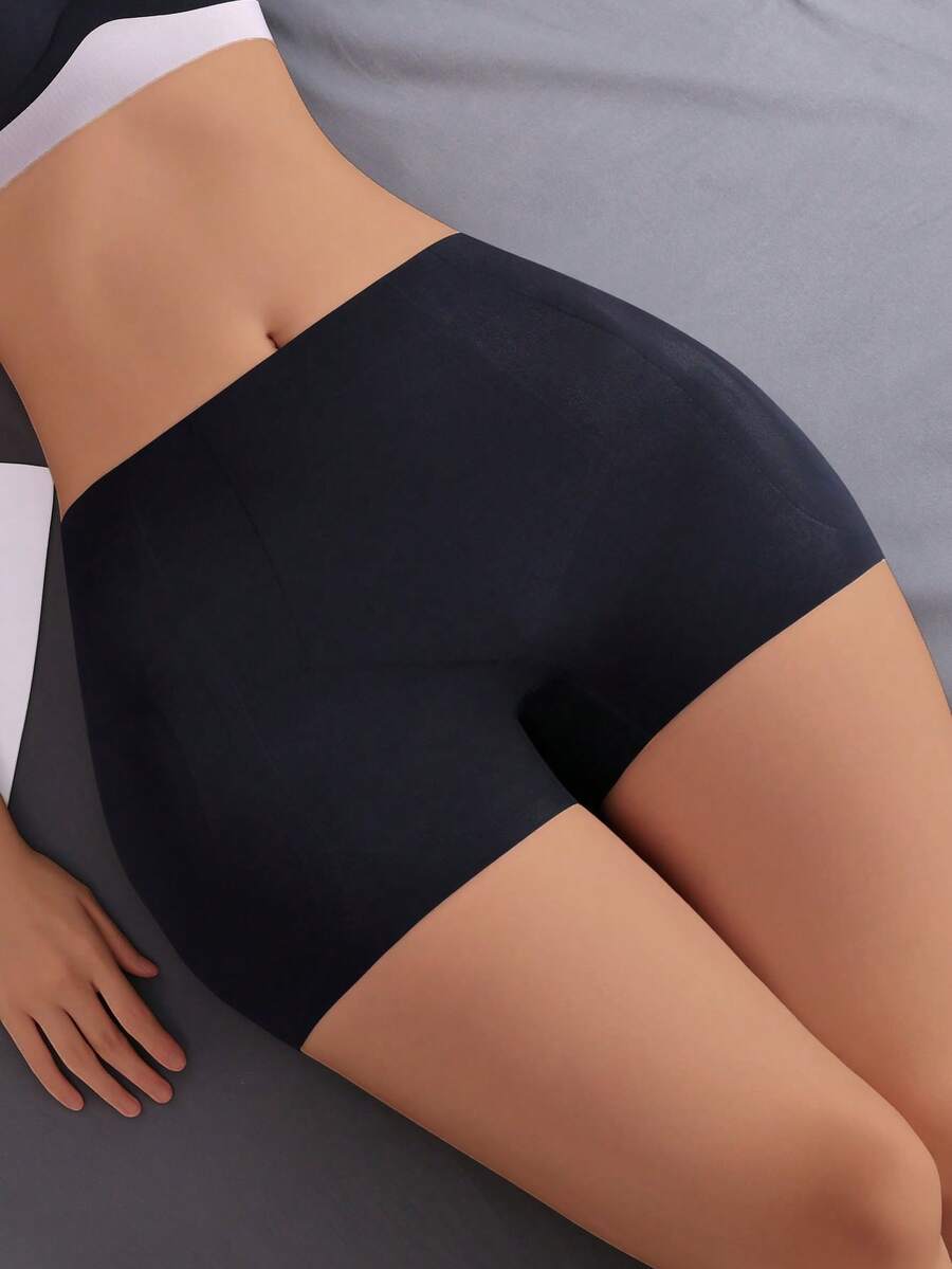 Women's high waist seamless tummy control panties with hip enhancer padding in apricot.