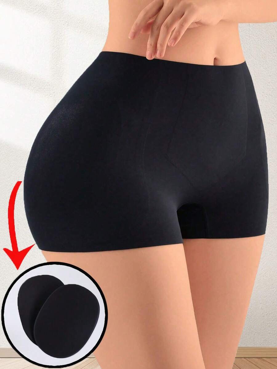 Women's high waist seamless tummy control panties with hip enhancer padding in apricot.