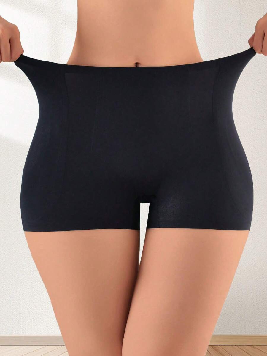 Women's high waist seamless tummy control panties with hip enhancer padding in apricot.