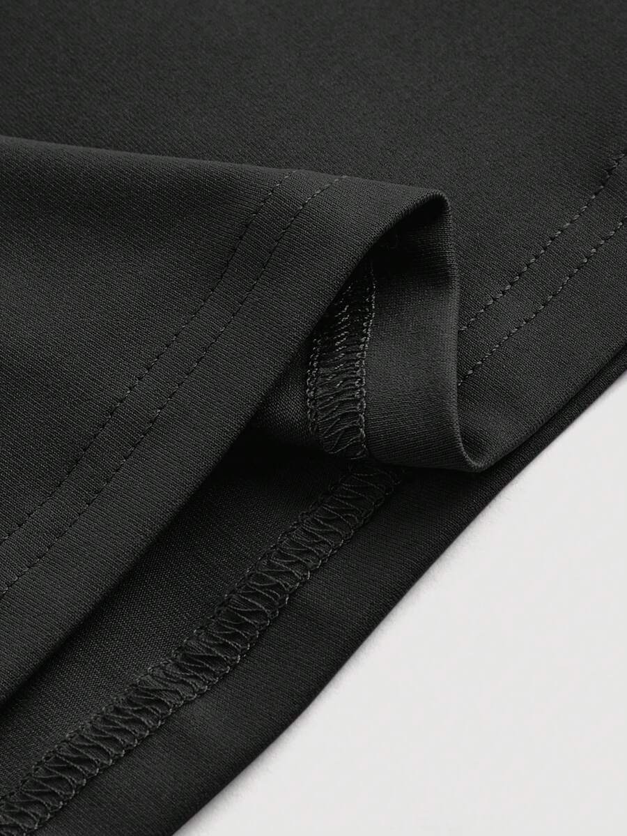 Women's black sleeveless halter neck A-line mini dress featuring backless ruched knot details and slim fit stretch knit fabric.