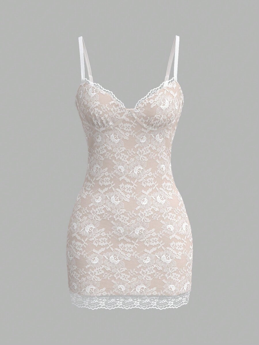 Sweetina white lace splicing cami mini dress featuring hand-sewn 3D flowers, spaghetti straps, ruched slim fit silhouette, and contrast lace details.