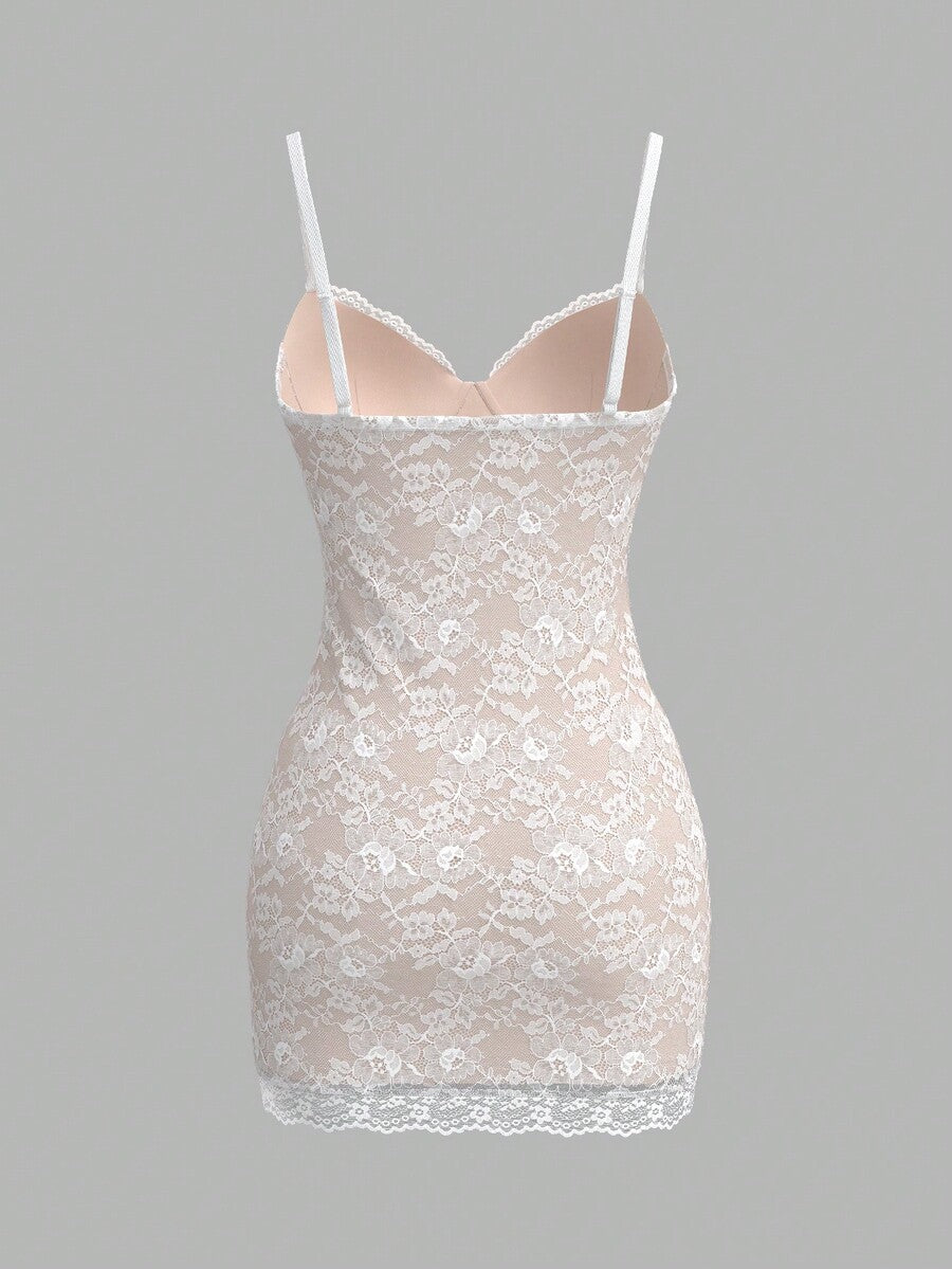 Sweetina white lace splicing cami mini dress featuring hand-sewn 3D flowers, spaghetti straps, ruched slim fit silhouette, and contrast lace details.