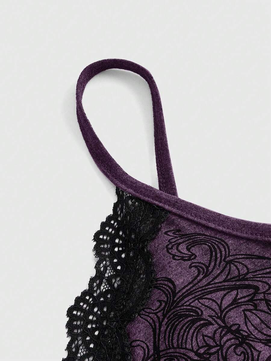 Pink floral print crop camisole top for women featuring contrast lace trim, spaghetti straps, and a slim fit.