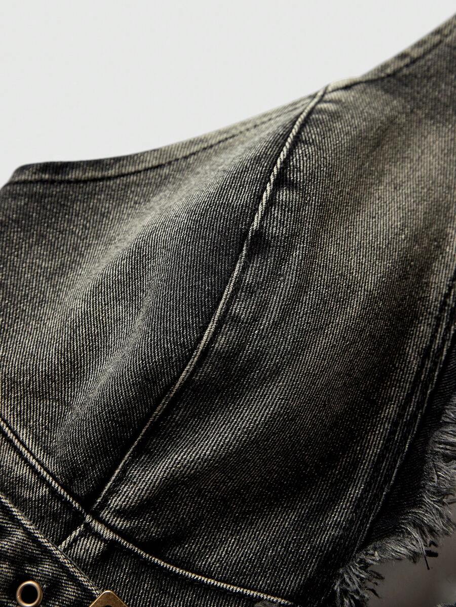 Women's denim halter crop top featuring a backless design, asymmetrical hem, single-breasted front, and lettuce trim.
