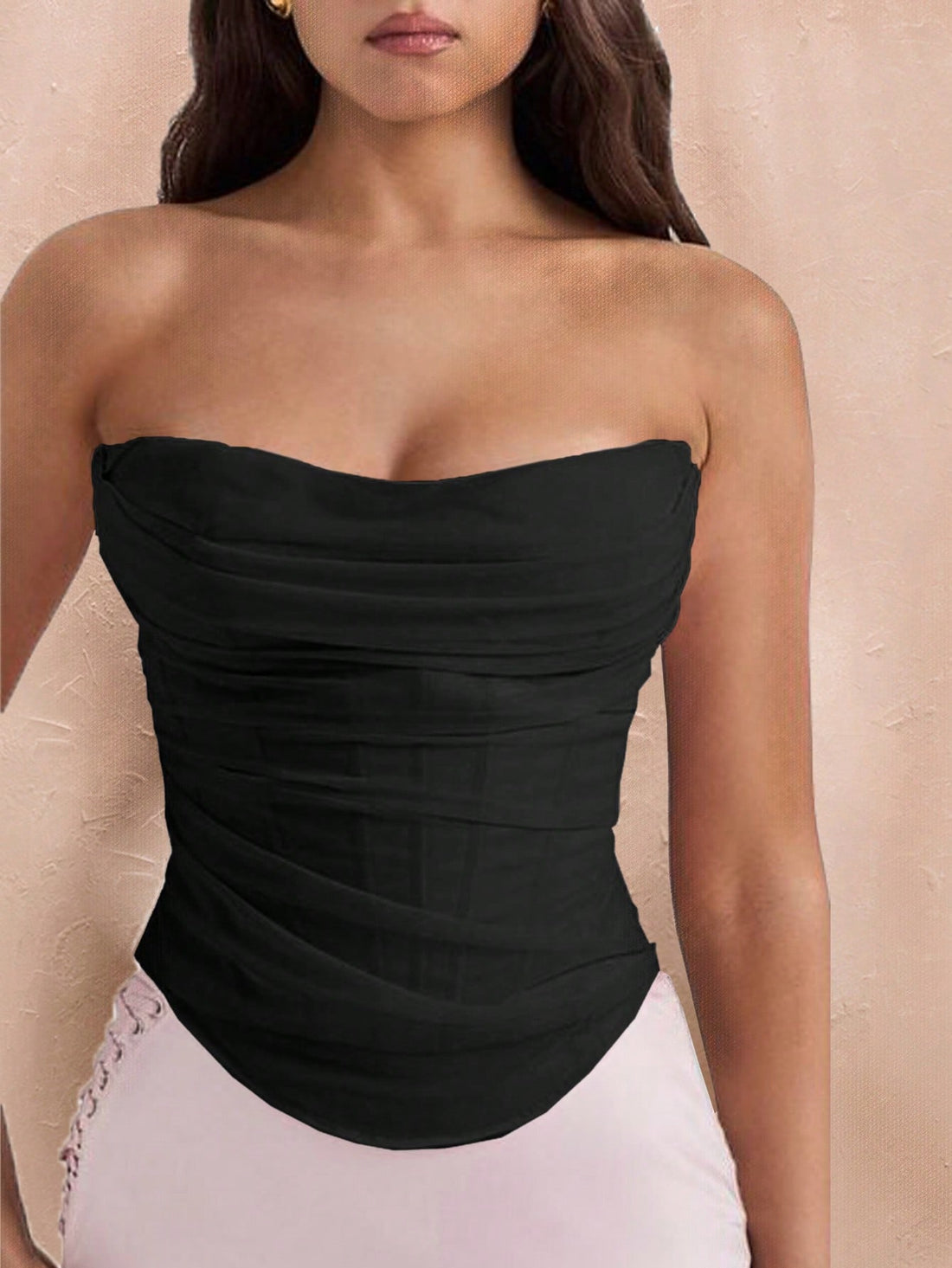 Black strapless corset crop top with asymmetrical lace-up ruched detailing and a slim fit for women.