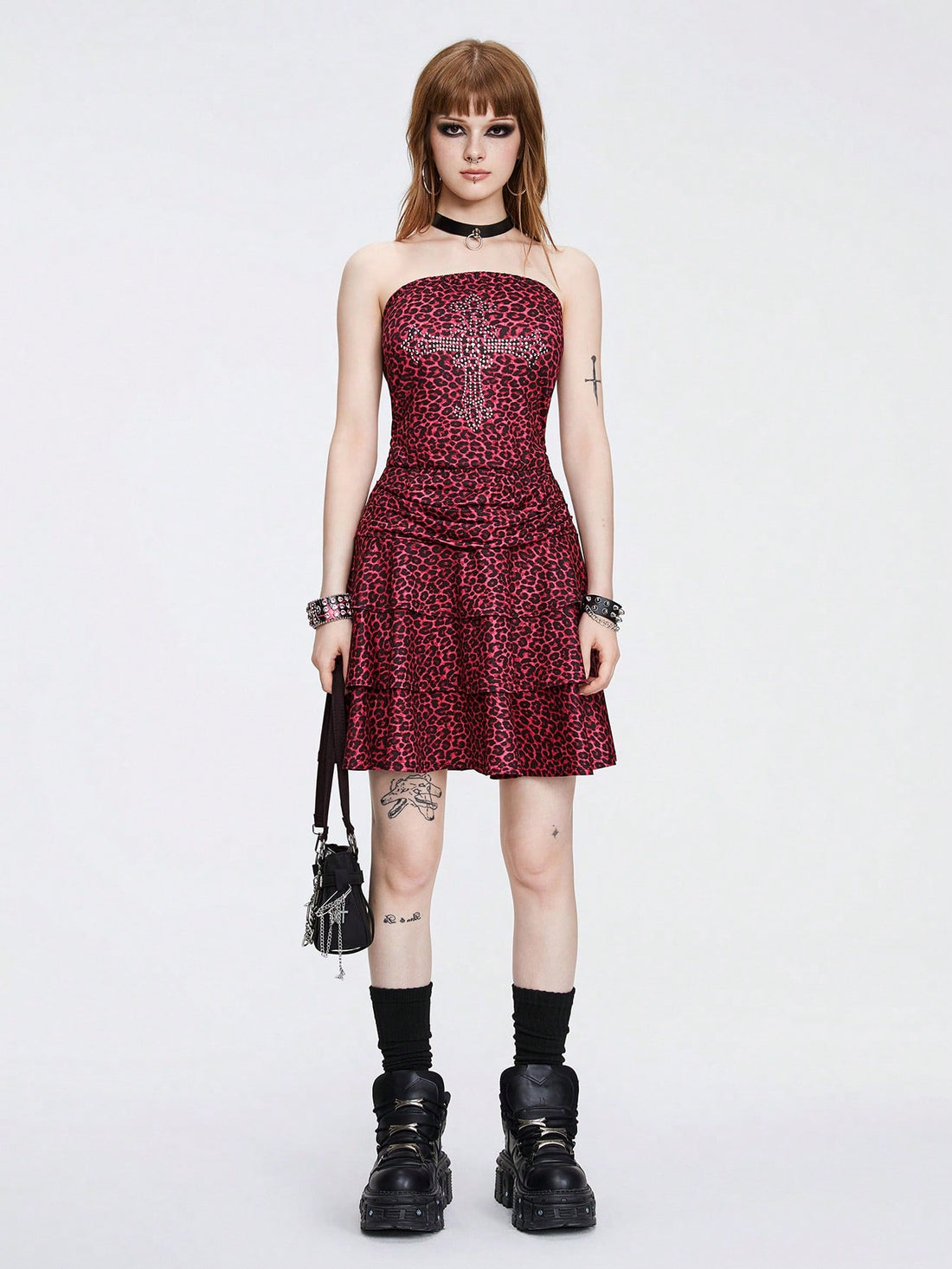 Red strapless mini dress for women featuring a high-waisted slim fit with a tiered ruffle hem in stretch knitted fabric.