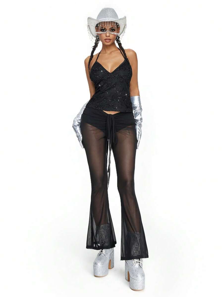 Women's black mesh sequin halter top featuring a backless design, knot details, and lace fabric.