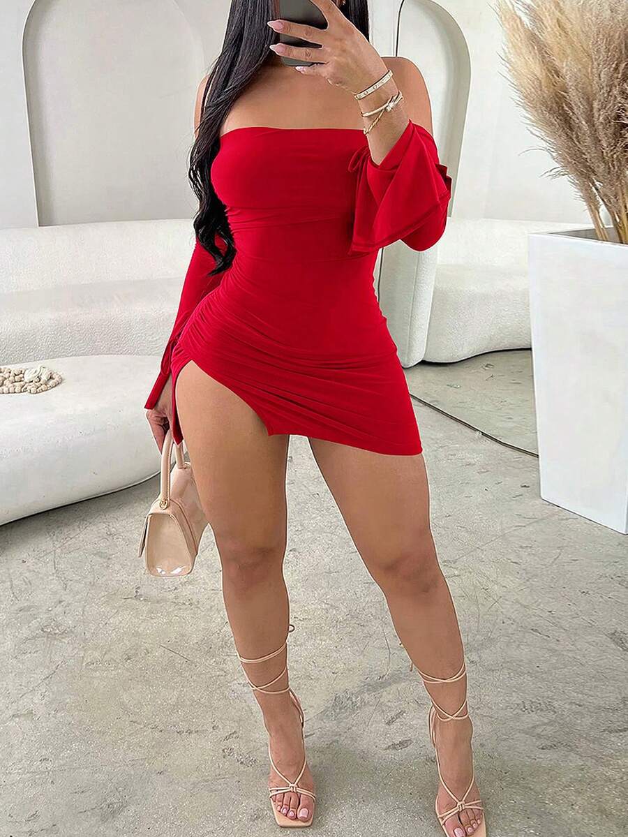 White off-the-shoulder sleeveless bodycon mini dress featuring ruched details, backless design, and asymmetrical high-split hem.