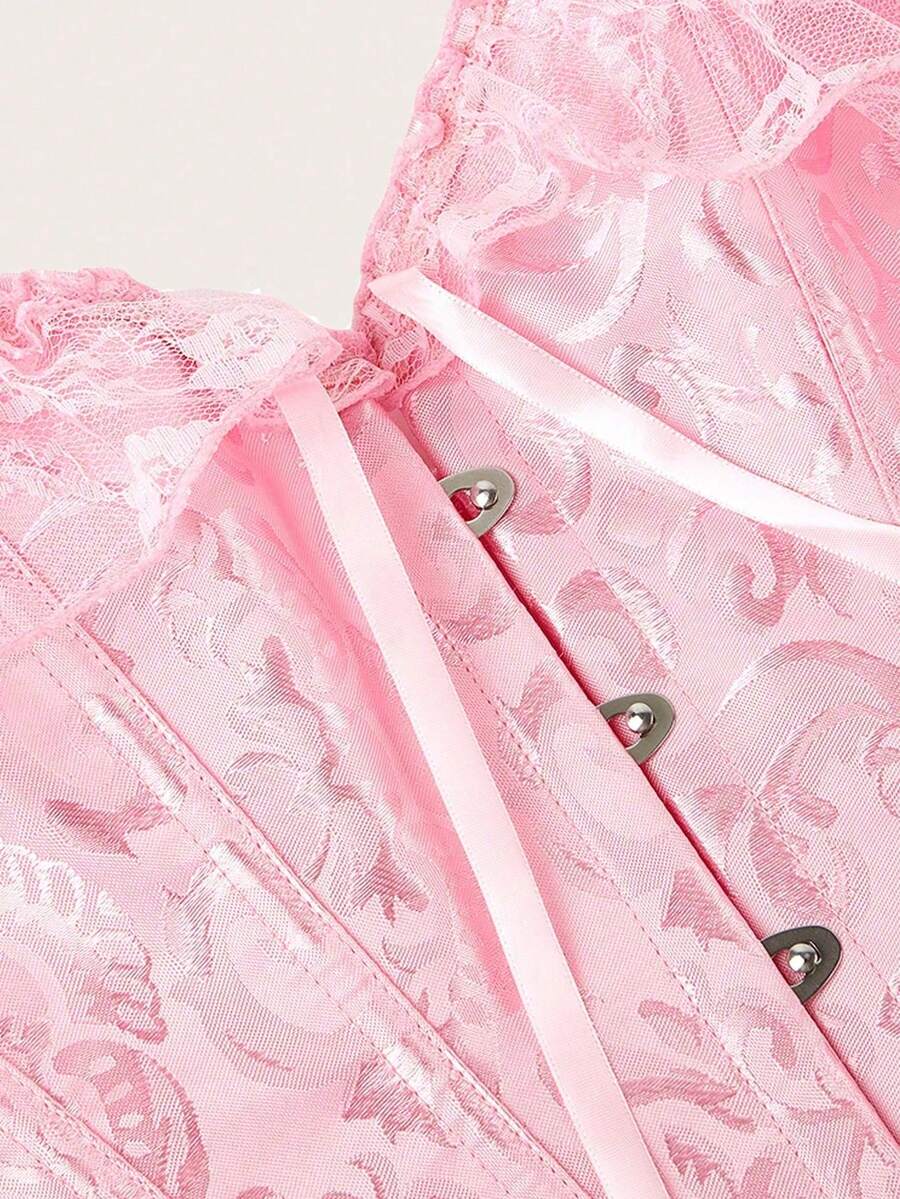 Vintage pink women's corset waist cincher with frill detail, designed for waist shaping and medium support.