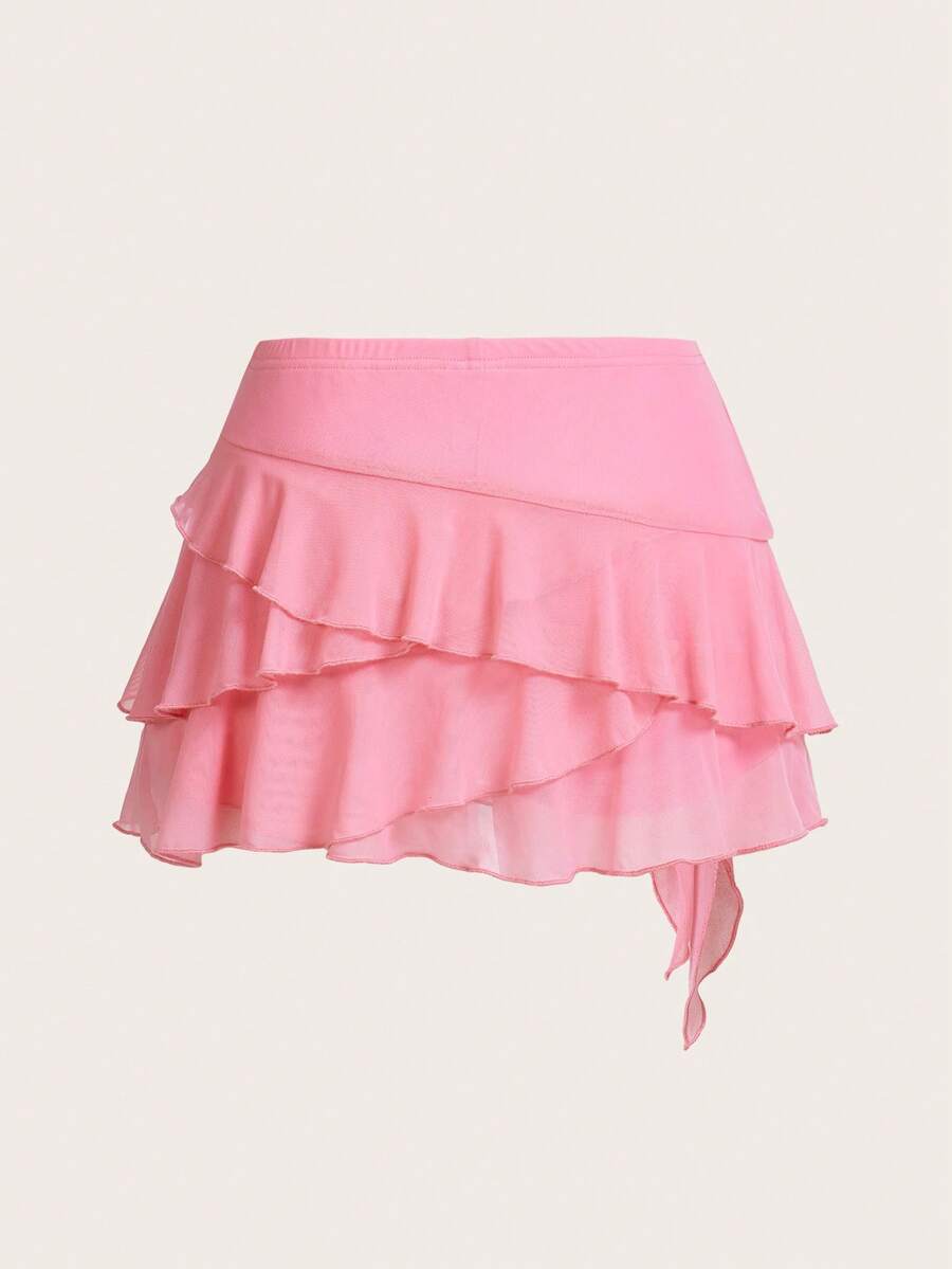 White tiered ruffle trim mini skirt for women with low waist, knot detail, mesh fabric, and casual Y2K boho design.