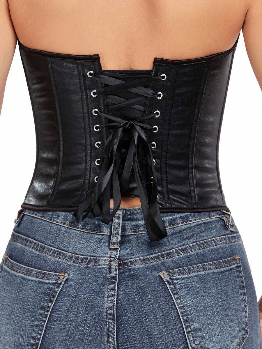 Women's black vintage boned bandeau corset top featuring a crisscross back design.